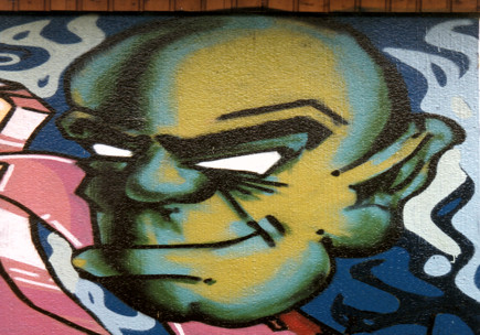 graffiti with an alian face